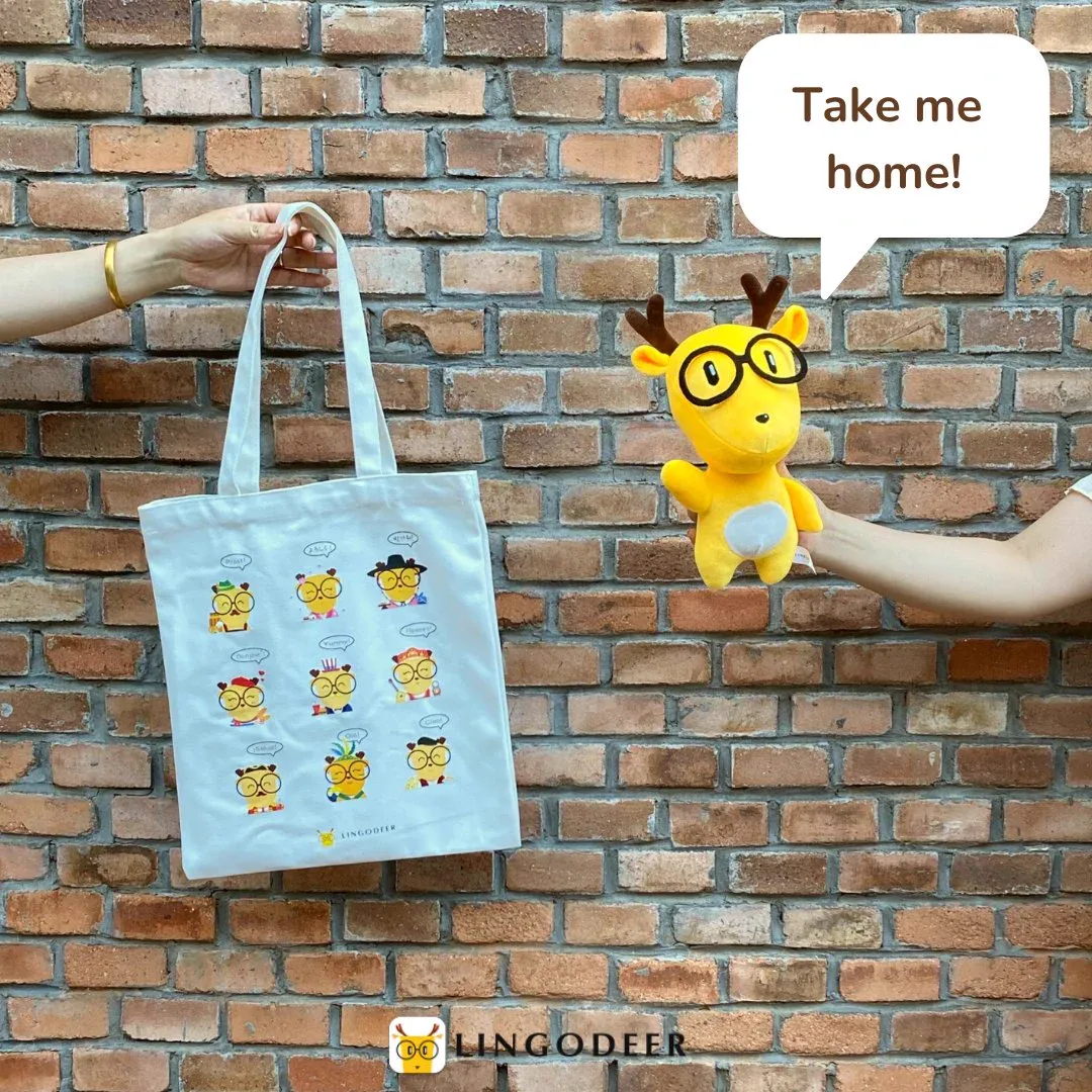 LingoDeer plush mascot held beside a branded tote in an official giveaway