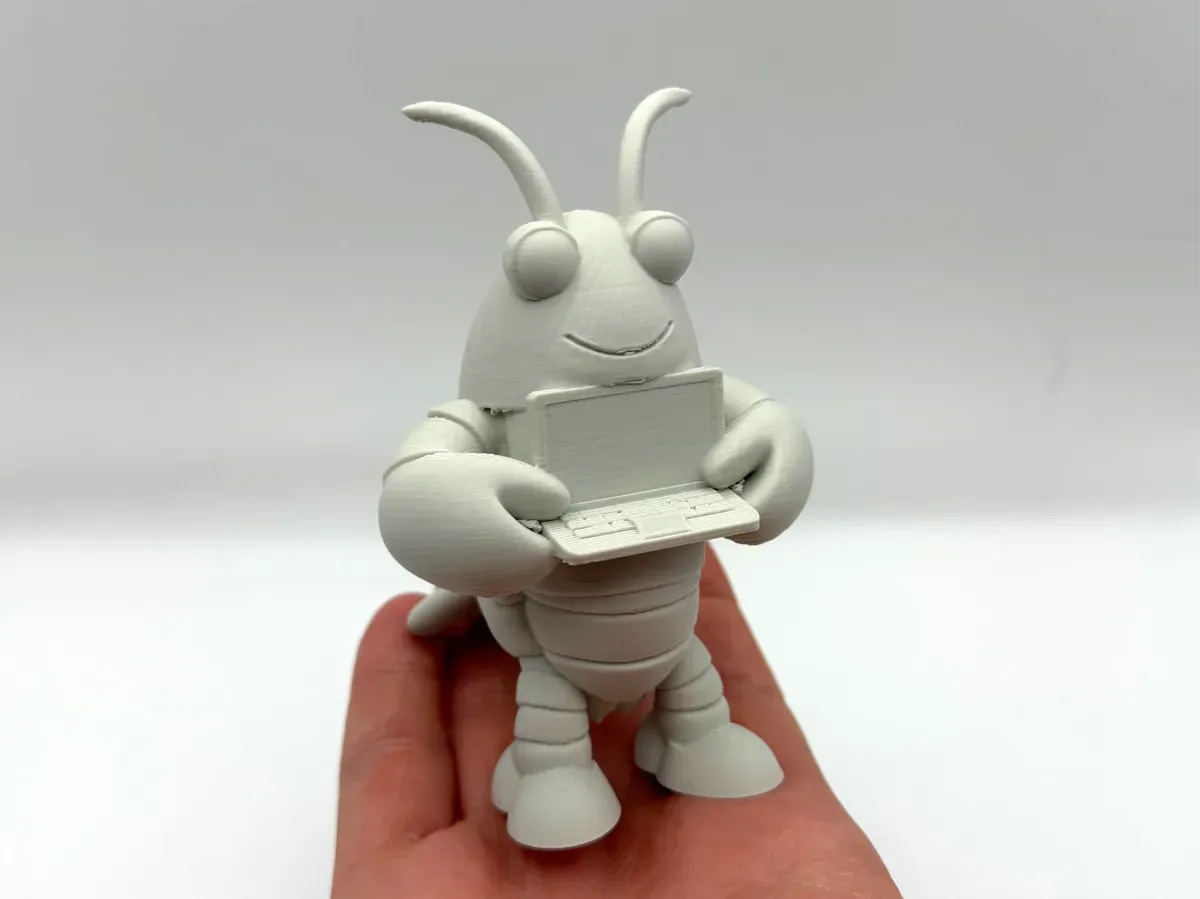Full-body Molty 3D print held in a person's hand
