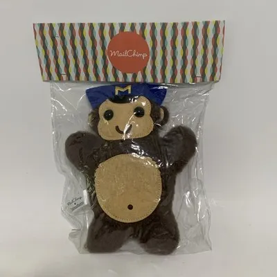 Freddie Mailchimp plush toy in its original branded packaging