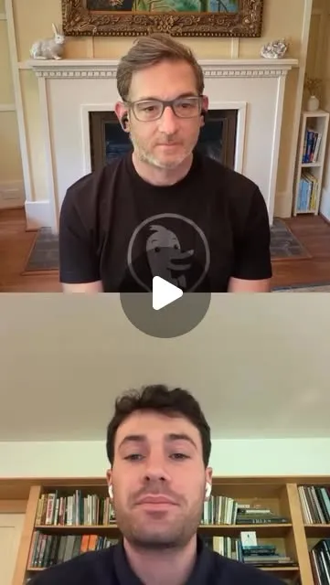 DuckDuckGo founder wearing a black shirt with a large Dax mascot