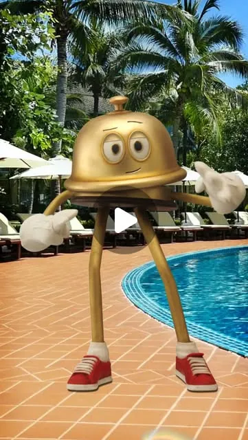 Bellboy standing beside a resort pool