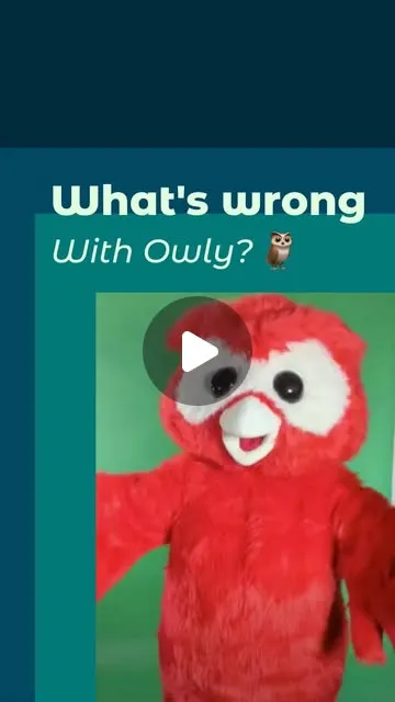 Owly in a bright red full-size mascot costume